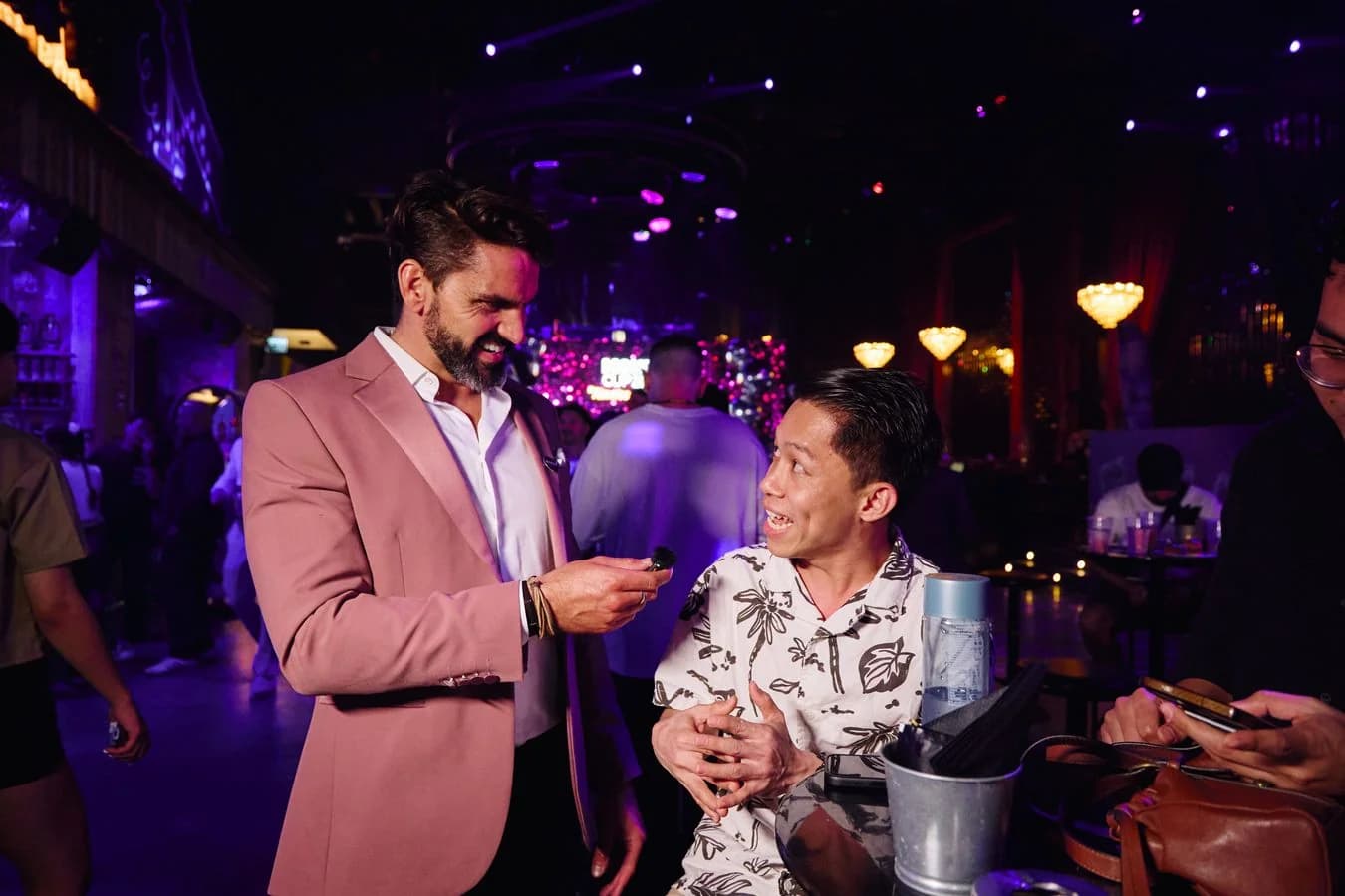 Darryl Rees chatting with a guest at the Monin Cup 2026 event in Dubai